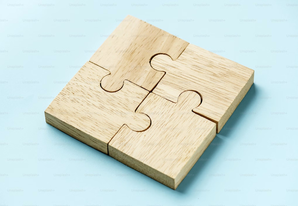 Wooden puzzle on a blue background.